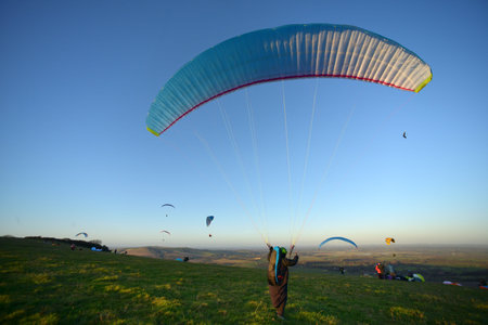 Paragliders taking off from the South Downs