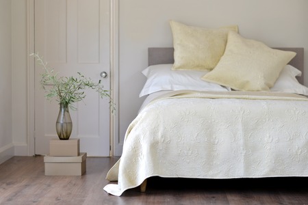 Bedroom setting with luxury pillows, shams and duvetsの写真素材