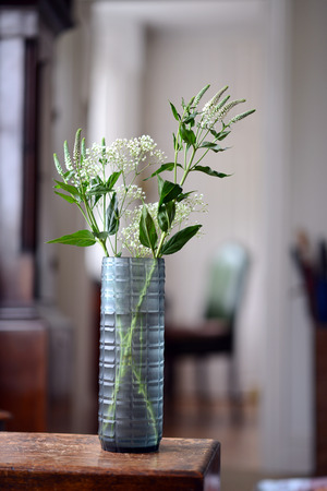 blue, straight sided decorative glass vase with checker pattern.の写真素材
