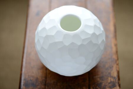 Round cut glass vase with decorative patternの写真素材