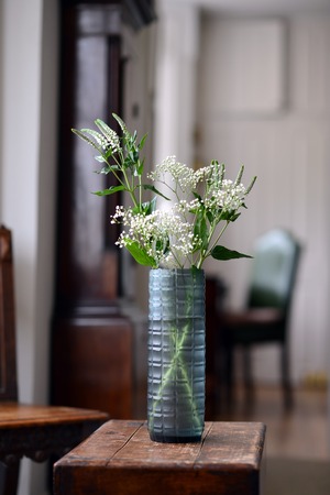 blue, straight sided decorative glass vase with checker pattern.の写真素材