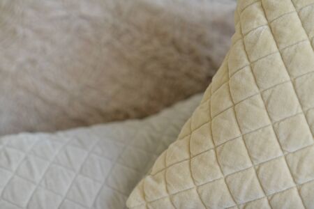 Textural quilted and ruched fabrics close upの写真素材