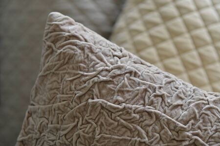 Textural quilted and ruched fabrics close upの写真素材