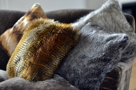 Faux fur throws and cushions room interiorの写真素材