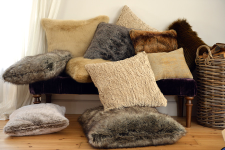 Faux fur throws and cushions room interiorの写真素材