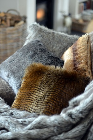 Faux fur throws and cushions room interiorの写真素材