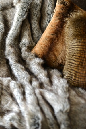 Faux fur throws and cushions room interiorの写真素材