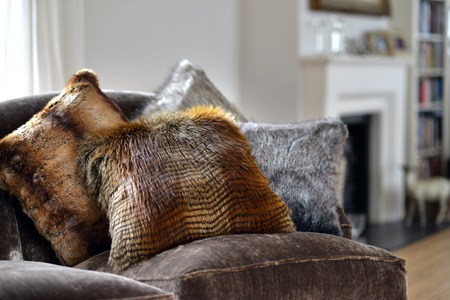 Faux fur throws and cushions room interiorの写真素材