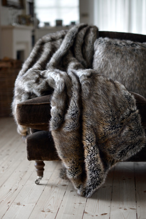 Faux fur throws and cushions room interiorの写真素材