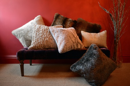 Faux fur throws and cushions room interiorの写真素材