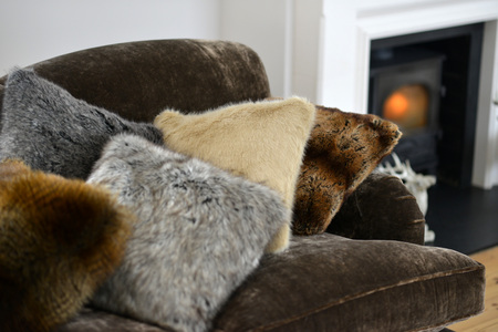 Faux fur throws and cushions room interiorの写真素材