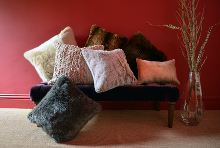 Faux fur throws and cushions room interiorの写真素材