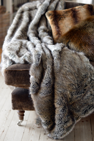 Faux fur throws and cushions room interiorの写真素材