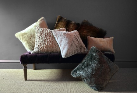 Faux fur throws and cushions room interiorの写真素材