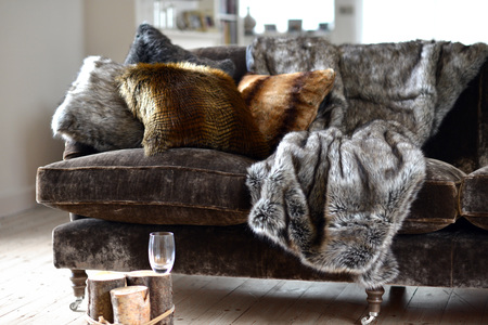 Faux fur throws and cushions room interiorの写真素材