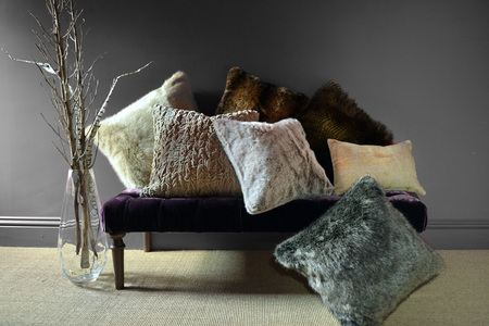 Faux fur throws and cushions room interiorの写真素材