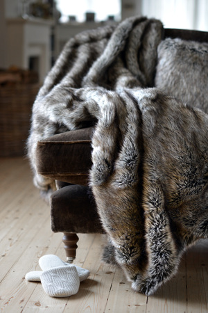 Faux fur throws and cushions room interiorの写真素材
