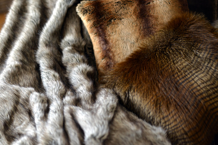 Faux fur throws and cushions room interiorの写真素材