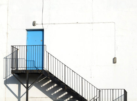 Blue fire exit with metal stair case