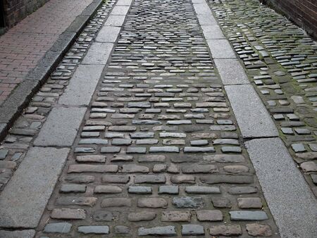 Old cobbled street in Lewes, East Sussexの写真素材