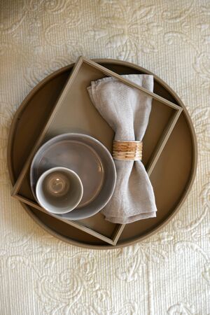 Fawn leather tray in a bedroom settingの写真素材