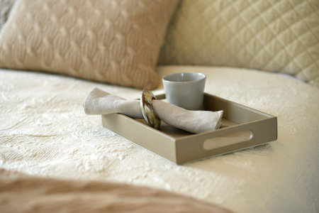 Fawn leather tray in a bedroom setting