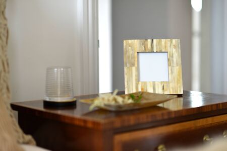 natural horn picture frames in a bedroom settingの写真素材