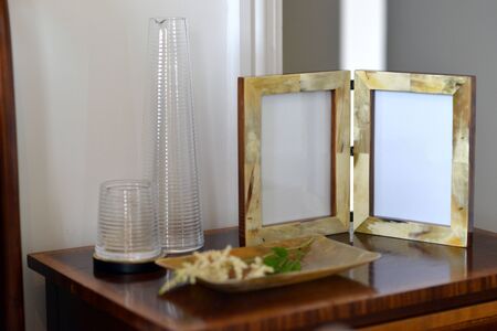 natural horn picture frames in a bedroom settingの写真素材