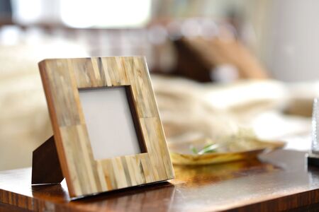 natural horn picture frames in a bedroom settingの写真素材