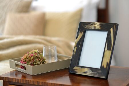 natural horn picture frames in a bedroom settingの写真素材