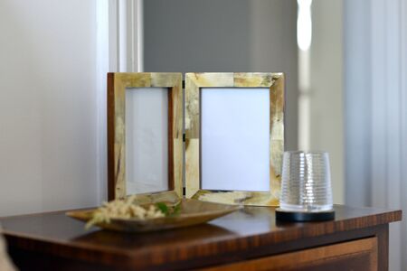 natural horn picture frames in a bedroom settingの写真素材