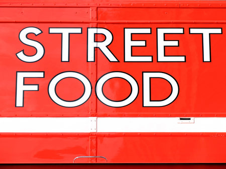 Red and white street food sign on a London busのeditorial素材
