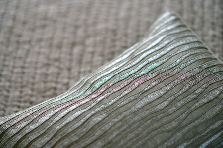 Quilted textured grey soft bedding materialの写真素材