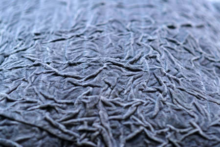 Details on textured and quilted sofa cushionsの写真素材