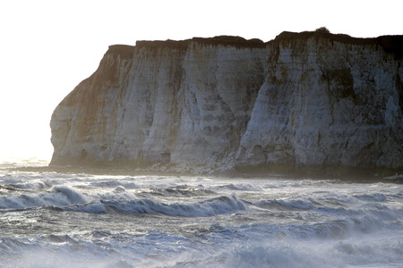 Stormy sea and chalk cliffs in Newhaven, East Sussexの写真素材