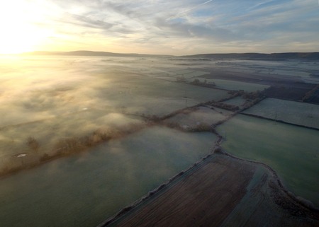 Small English village on a frosty and misty morningの写真素材