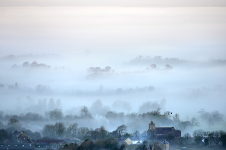 Low mist surrounding the Sussex countryside in the South Downs National Parkの写真素材