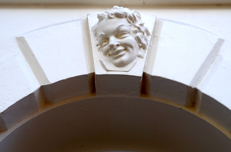 Alabaster relief face above a Georgian doorwayの写真素材