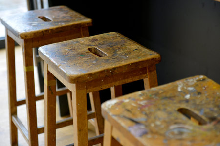 Old school lab stools in a modern kitchen.