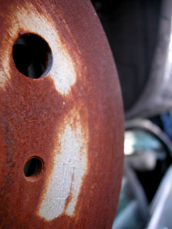 Closeup of metal rusted car parts, focus on detail
