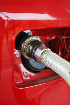 Ecologic methane red car fueling detailの写真素材