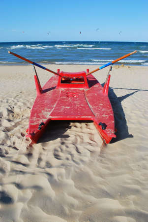 Typical red rescue boat by the sea, Rimini, Italyの写真素材