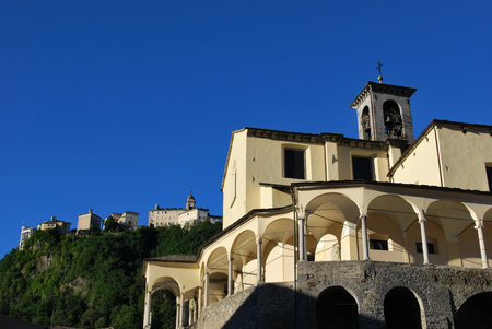 St. Gaudenzio church against blue sky, Sacred mountain sanctuary on background, Varallo Sesia, Piedmont, Italy の写真素材