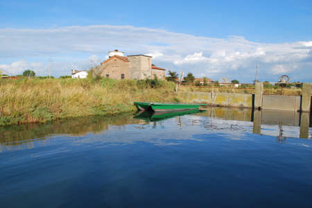 Landscape with farm house and canal, Cervia, Ravenna, Italyの写真素材