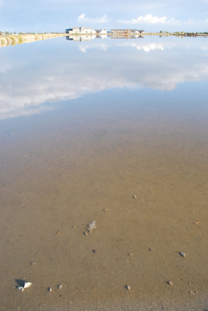 Scenic saltern and water reflections, Cervia, Ravenna, Italyの写真素材