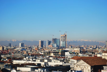 Landscape panoramic view of Milan from Duomo cathedral roof, skyscapers district in background, Lombardy, Italyの写真素材