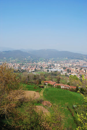 Panoramic view of Bergamo city and hills in spring, Lombardy, Italy