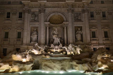 Beautiful Trevi Fountain with Ocean god and tritons statuesの写真素材