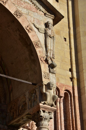 Detail from Basilica of San Zeno portal with beautiful romanesque sculptures and reliefs, in Verona, Italyの写真素材