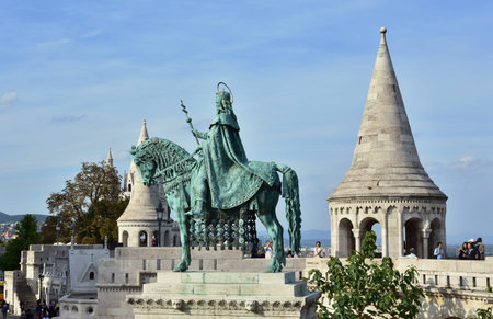 Budapest, Hungary, September 16, 2016: Tourists visit the characteristic Fisherman's Bastion in Budapest, a panoramic terrace built in romanesque style at the end of 19th century, with Saint Stephen monumentのeditorial素材